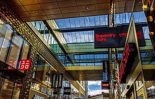 Roofed section with shop signs of Fredsgatan in Gothenburg, Sweden.