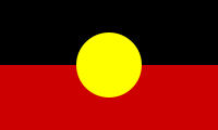 The Australian Aboriginal Flag, created by a private Australian citizen, was deleted from Commons because of how it was copyrighted at the time. (A similar design in the United States would likely not have been eligible for copyright protection, for being simple geometry.)