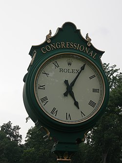 approx. 05:05 (or 17:05) displayed on clock/watch