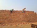 * Nomination: Workers unloading bricks. This media was uploaded as part of Wiki Loves Folklore 2025 international photographic contest. By User:Nobo Ganga --Myrealnamm 21:26, 31 March 2025 (UTC) * Review Please add some more categories --Ermell 06:22, 1 April 2025 (UTC)