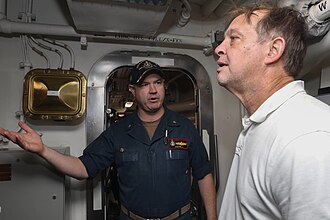 Commander Charles Cooper, journalist Dexter Filkins