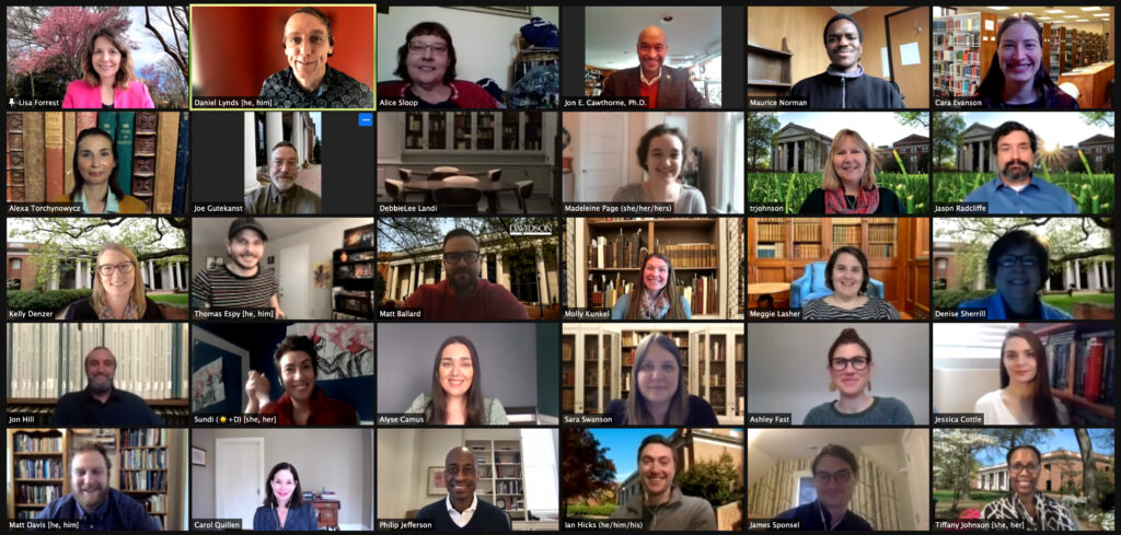 Image of a Zoom screen with E.H. Little Library staff member faces receiving ACRL award from ACRL President Jon E. Cawthorne