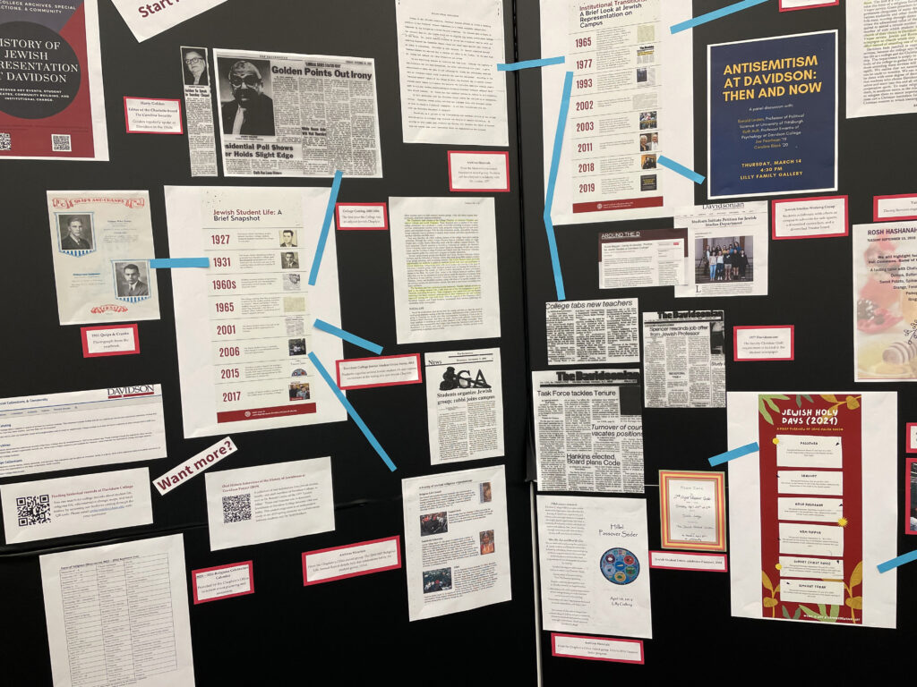 Display board featuring historical newspaper clippings about Jewish Life at Davidson.