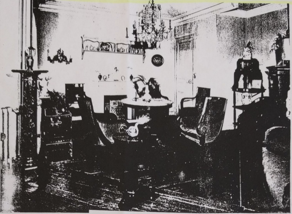 photo of a parlor with chandelier