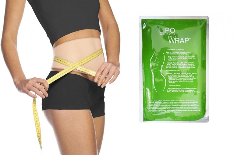 woman's torso with body wrap and waist measuring tape