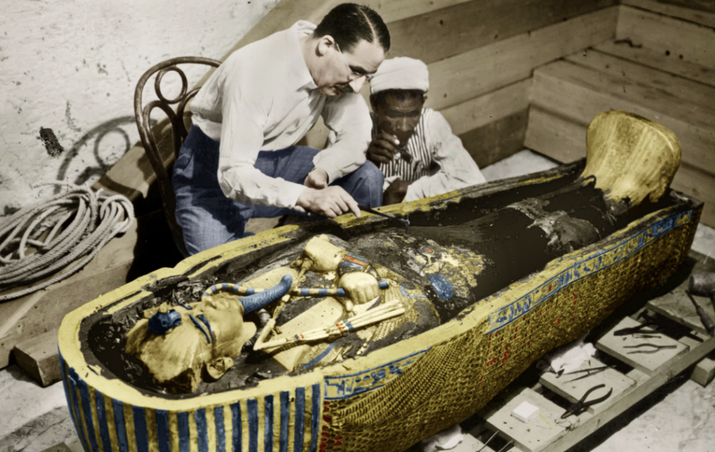 Howard Carter examining King Tut's tomb