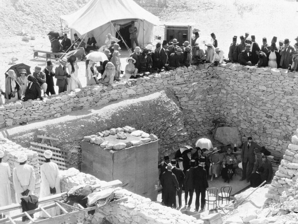 Williams, Maynard Owens. "Tourists outside Tutankhamun's tomb." Wikimedia Commons, May 1923.https://commons.wikimedia.org/wiki/File:Tourists_outside_Tutankhamun%27s_tomb,_February_1923.jpg