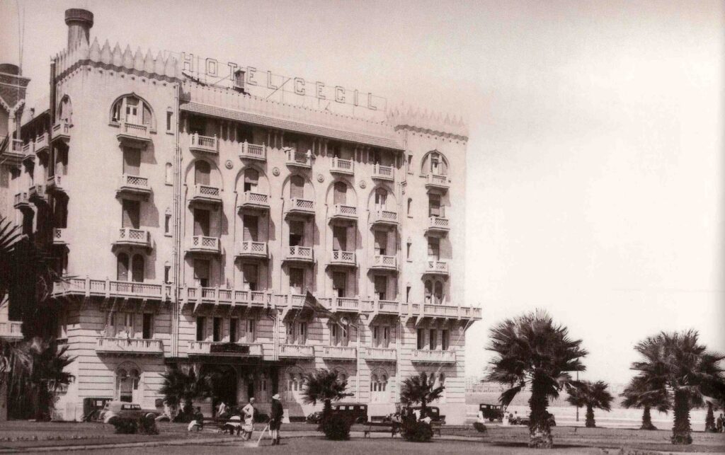 Exterior of the Hotel Cecil depicting the facade and the hotel's sign.