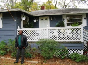 Carr in front of her current house on Griffith St. Photo courtesy of Amanda Lehnberg