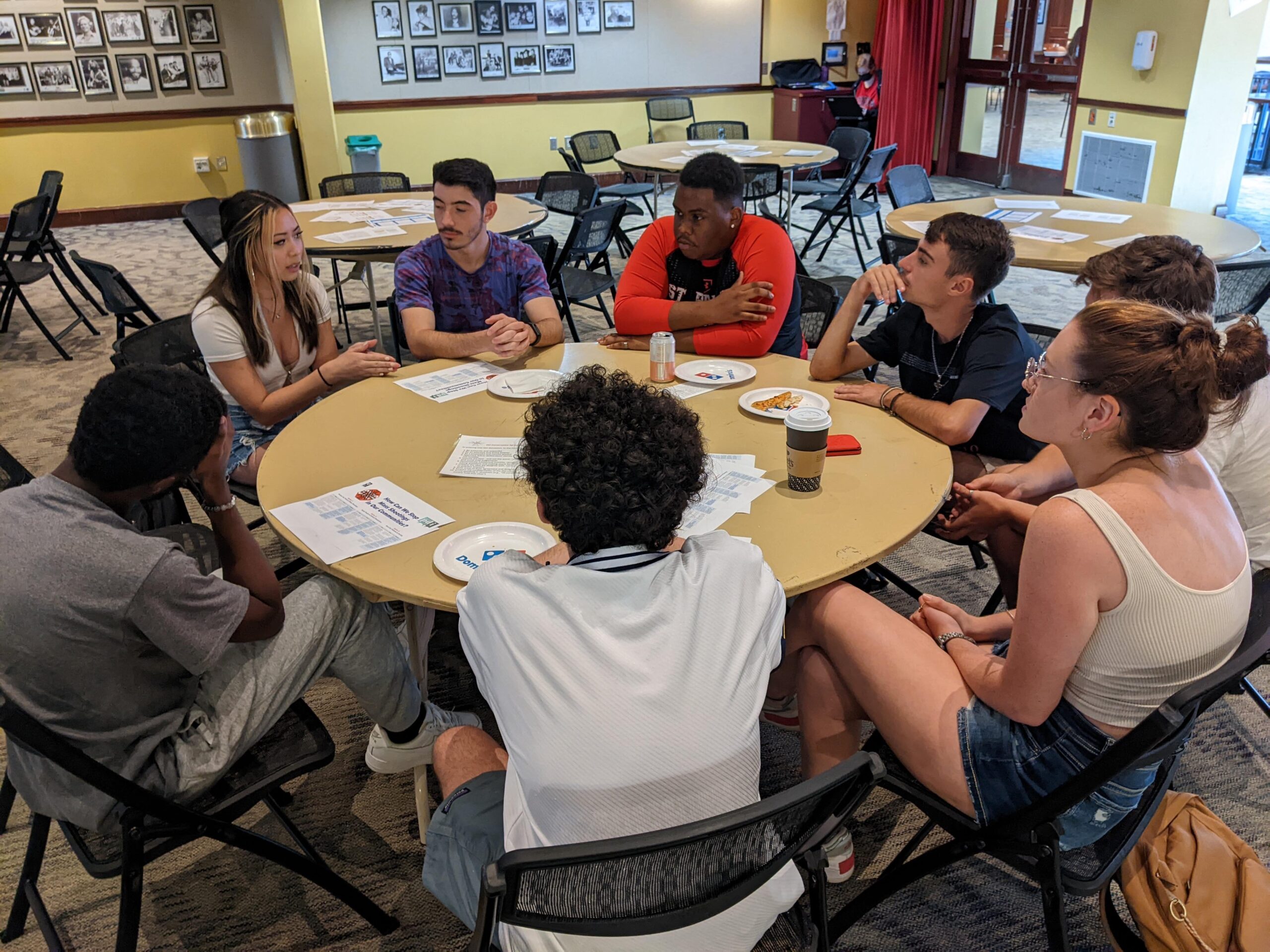 kickoff party for DCI with Students at a round table.