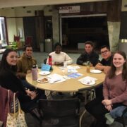 Davidson students gathering at a round table discussion