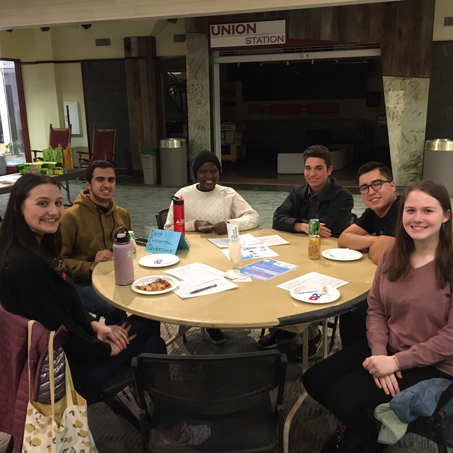 Davidson students gathering at a round table discussion
