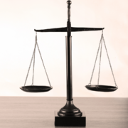 A balance scale sitting on a table.