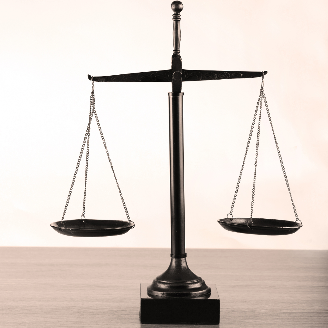 A balance scale sitting on a table.