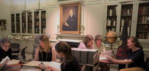 Color photo of staff members in the Rare Book Room