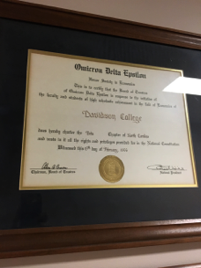 The certification given to Davidson College in February of 1966, establishing the Beta Chapter of Omicron Delta Epsilon. Although this certificate was awarded in February, the society was not formally established until April within the college.