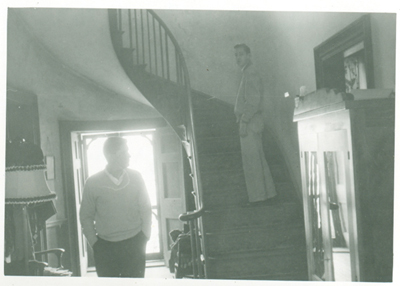 Davidson students visiting Elm Wood. The wooden staircase was removed and then lost to a fire.