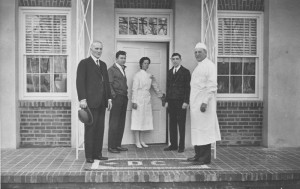 Davidson President Walter Lingle, college physician John MacConnell and nurse Sara Johnston along with students show off the new building