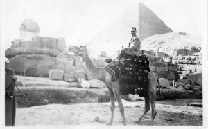 Prof. Eberhardt astride a camel with the Sphinx in the background