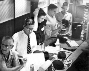 Fall 1954, new students picking up books and beanies.