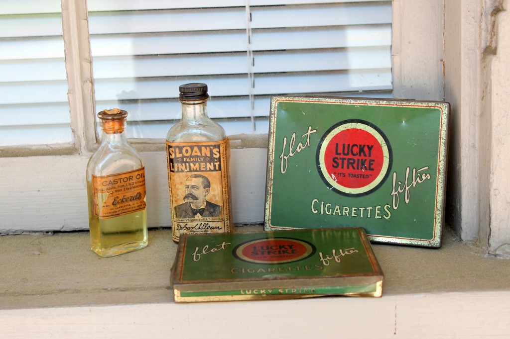 Castor Oil, Sloan's Family Liniment, Lucky Strike "flat fifties" cigaretts tin, all Found underneath the Carolina Inn!