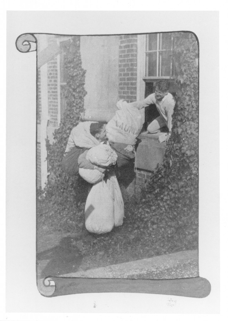 Students holding laundry bags  - possibly as part of an entrepreneurial scheme, or else as freshman hazing , 1910.