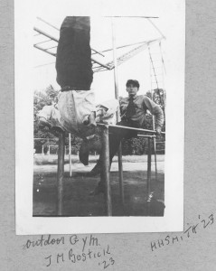 Students working out on outdoor gym equipment.