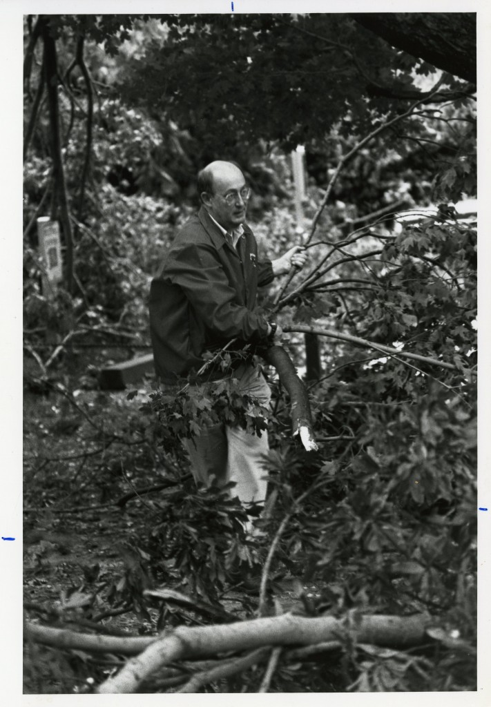 President Kuykendall assisted with the campus clean-up all day on Friday, September 22nd, 1989. He is pictured here carrying branches