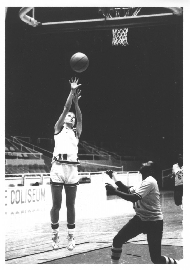 Davidson basketball player makes a jump shot, circa early 1980s.