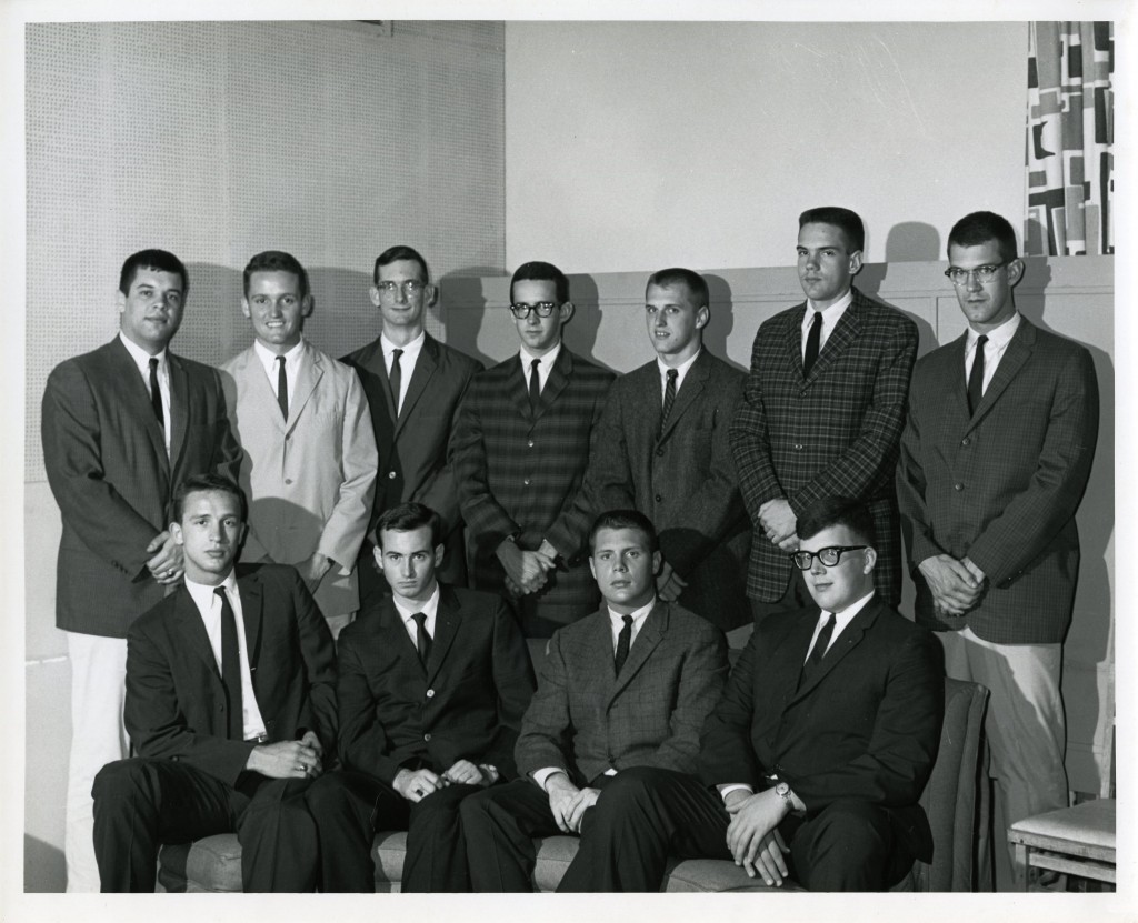 Possibly a meeting of Interfraternity Council in 1963 - clockwise from top row, left (all are Class of 1963, and presidents of their respective fraternities): Gene Wells, Lawrence Kimbrough, Bernard Swope, unknown, Alex Gibbs, Bill Clingman, Jamie Long, John Oehler, Lewis Martin, Bud Robinson, and Steve Butler.