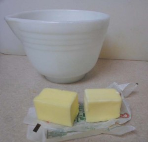 Vintage mixing bowl with softened butter