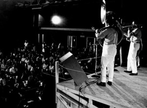 Music in the 1970s, a band performing on a stage in front of an audience