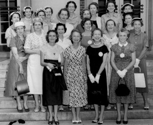 Photo of class spouses in front of chambers