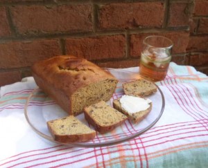 2015 version of Apple Sauce Nutbread with butter and a glass of sweet tea - the bread is a little dry so the recipe's recommendation to serve with butter is a good one.