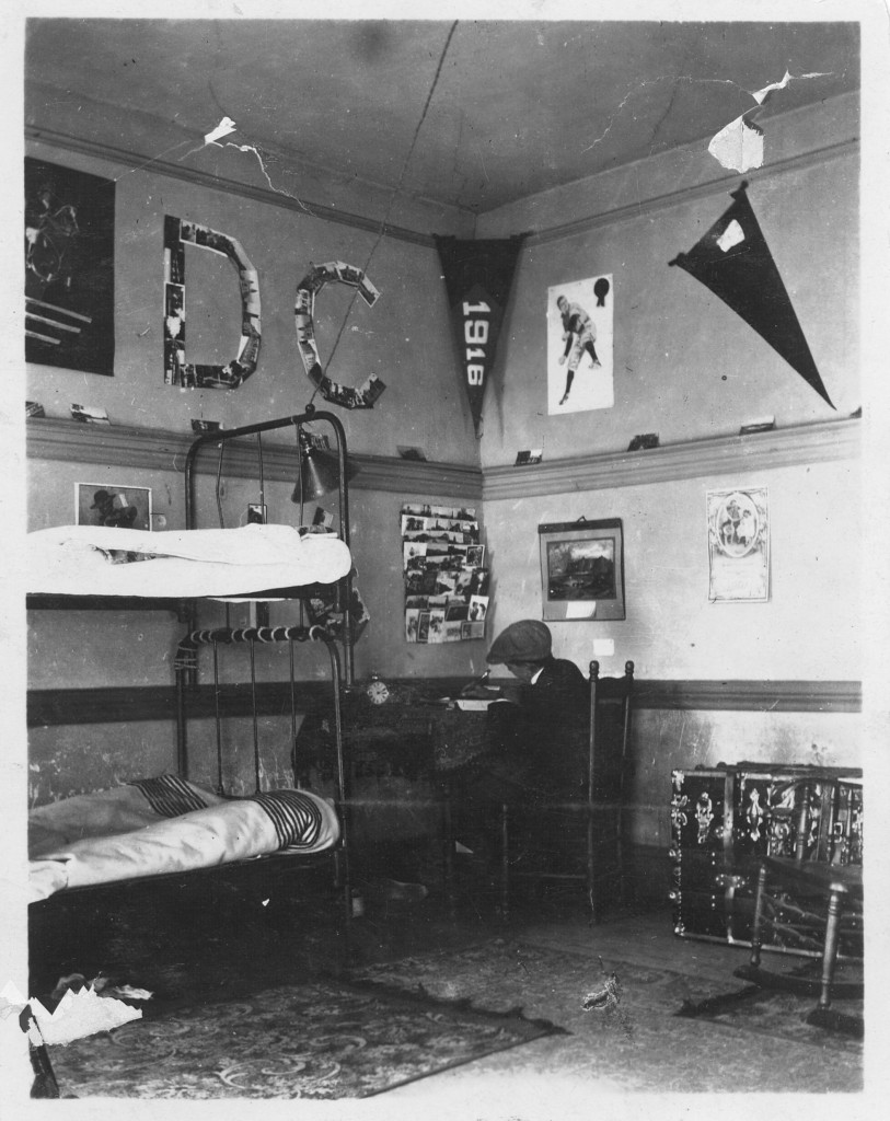 This picture, courtesy of Robert Hayne Jones (Class of 1916), illustrates what a typical dorm room in Old Chambers looked like - Pennants and picutres on the walls, check out the "D.C." constructed of either photographs or postcards.