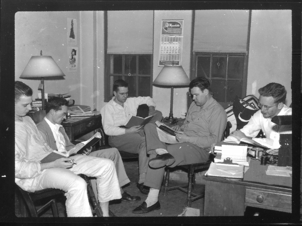 Five students gather in this dorm room in 1947 to do what Davidson students do best - study!