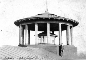 Cupola on old Chambers with a man standing on the roof, 1916.