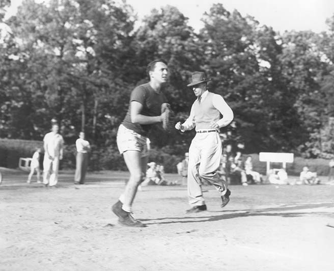 Faculty and seniors on the ball field