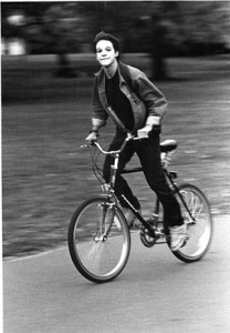 A mime riding a bike