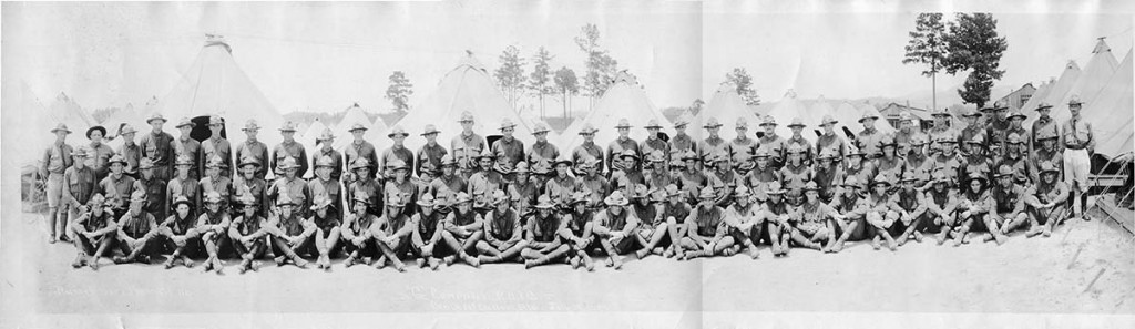 G Company of the Davidson's ROTC students, pose for a picture in uniform in front of their tents at Camp McClellan in Alabama.