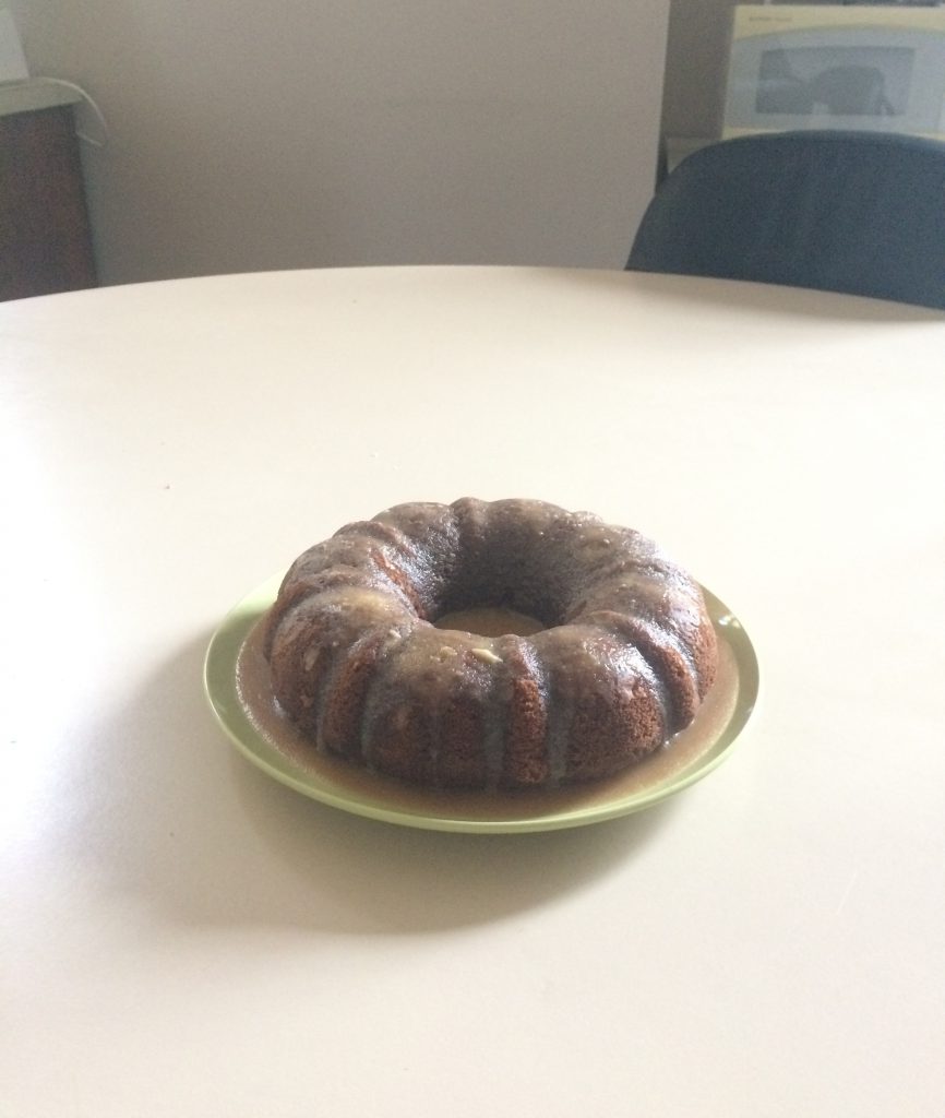 The final product of Sassy Spice Cake on a ceramic plate