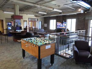 Alvarez Union lounge area with a foosball table