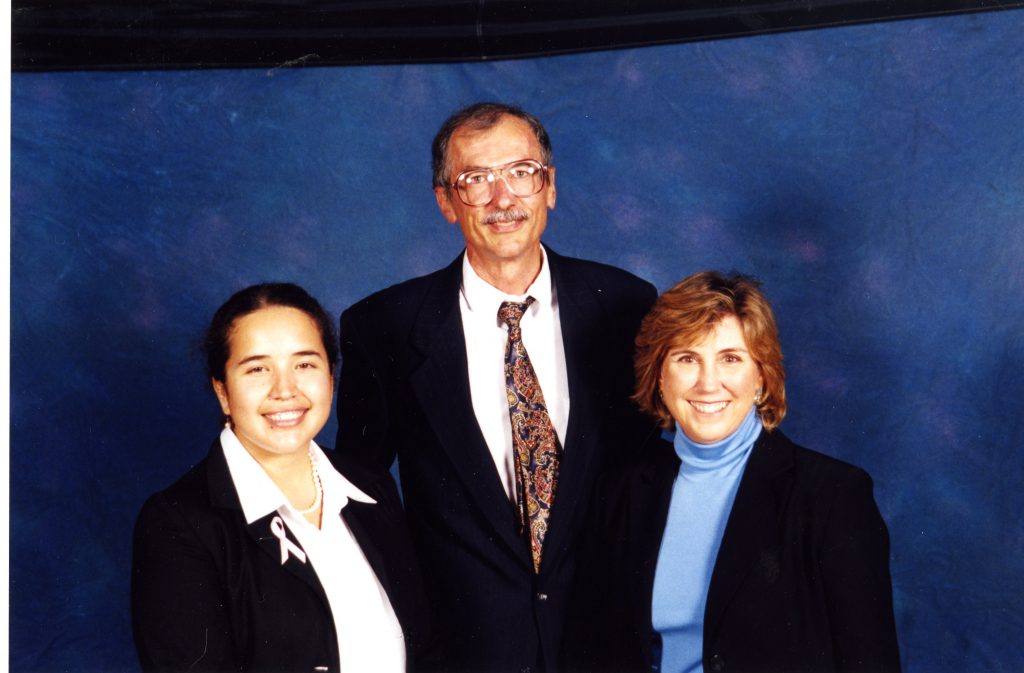 Bill Giduz and Meg Kimmel stand with a student at the Belk Scholarship Awards Ceremony in 2000.