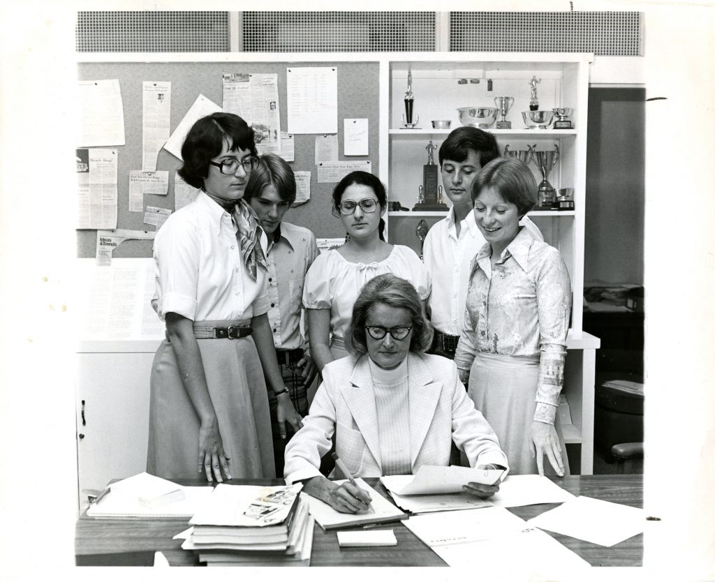 Jean Cornell with members of the debate team in 1976. From left to right: Nancy Northcott (Class of 1977), Eric Daub (Class of 1979), Maria Patterson (Class of 1979), Jimmy Prappas (Class of 1980), and Ellen Ogilvie (Class of 1978).