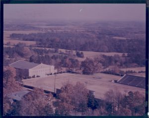 Aerial photo of Johnston Gym and Richardson Stadium and Field; the roof of the Ovens College Union is visible.