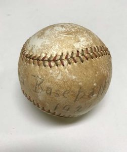 Baseball from 1921 with, "Davidson Baseball 1921" written on it.