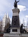 The Brigham Young Monument in front of the Joseph Smith Memorial Building