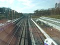 LGV Rhin-Rhône en direction de Dijon, depuis la passerelle enjambant les voies de la gare de Besançon Franche-Comté TGV. À gauche la rame de TGV Euroduplex (2N2) numéro 4703, à droite la rame de TGV Duplex Dasye numéro 746
