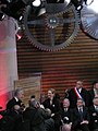 Nathalie Kosciusko-Morizet et Guillaume Pepy inaugurant la gare de Besançon Franche-Comté TGV en dévoilant la plaque inaugurale sous l'horloge de la gare actionnée par un rotor de TGV